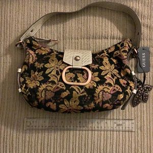 Guess bag. New with tags. Black with floral design
